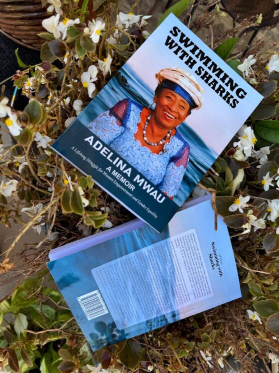 SWIMMING WITH SHARKS By Adeline Mwau